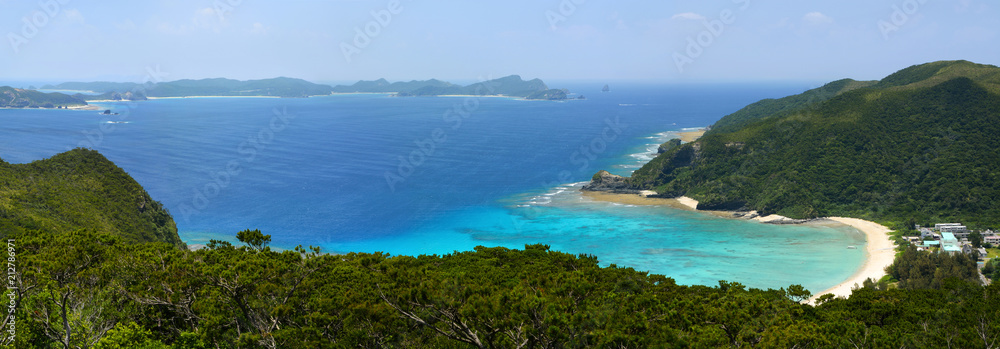 Panorama of a beautiful cove and coral reef at Tokashiku Beach on Tokashiki Island in Okinawa, Japan