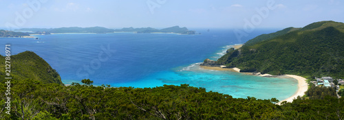 Panorama of a beautiful cove and coral reef at Tokashiku Beach on Tokashiki Island in Okinawa, Japan © David Carillet