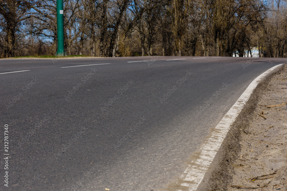 Detail photo of the urban asphalt road