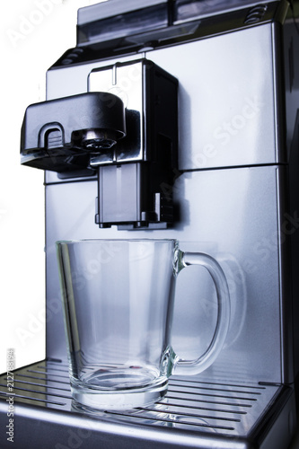 Automatic gray coffee machine close-up stands in the kitchen