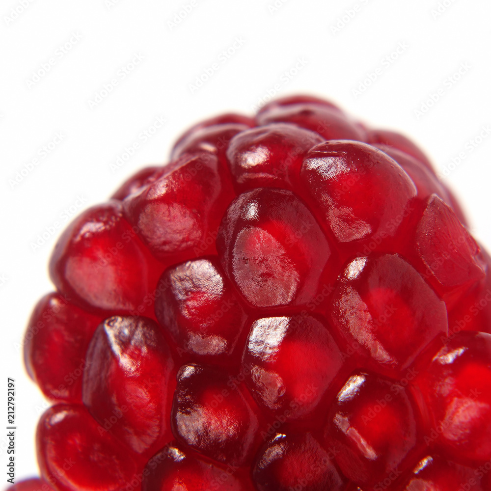 peeled pomegranate fruit closeup on white background peeled pomegranate fruit closeup on white background