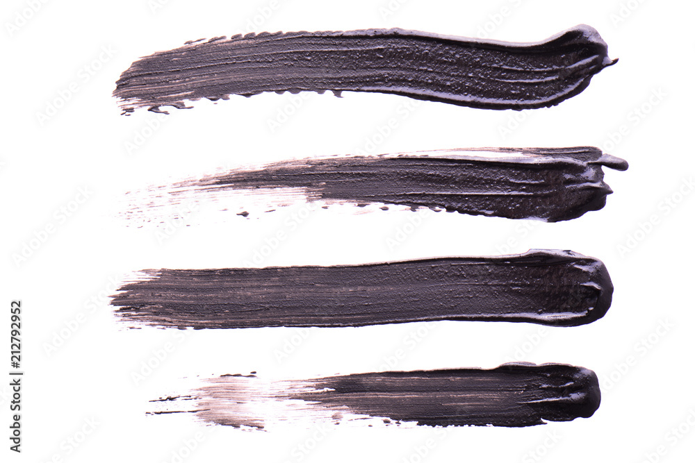 Set of Black strokes of mascara on a white background. Texture of black mascara for eyelashes isolatedon white. Smear of black mascara for eyelashes. Black mascara or paint smears Set of Black strokes of mascara on a white background. Texture of black mascara for eyelashes isolatedon white. Smear of black mascara for eyelashes. Black mascara or paint smears