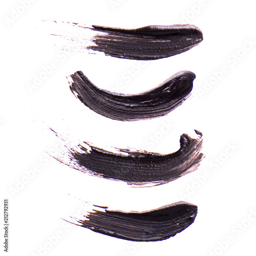 Set of Black strokes of mascara on a white background. Texture of black mascara for eyelashes isolatedon white. Smear of black mascara for eyelashes. Black mascara or paint smears