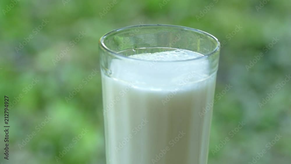 Faceted glass with milk Faceted glass with milk