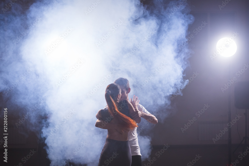 Young love couple dancing social danse kizomba or bachata.