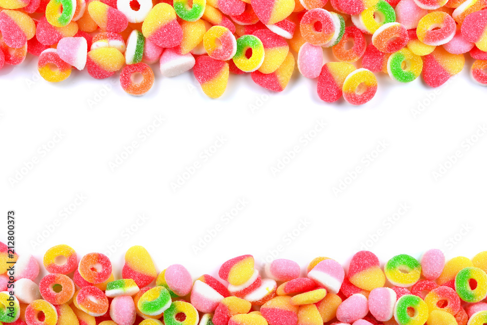 Frame of assorted gummy candies isolated on white. Top view. Space for text or design. Frame of assorted gummy candies isolated on white. Top view. Space for text or design.