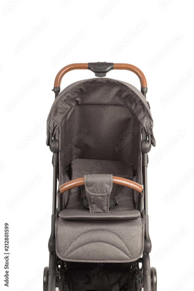 Fototapeta premium A stroller on a white background, details of a stroller close-up.