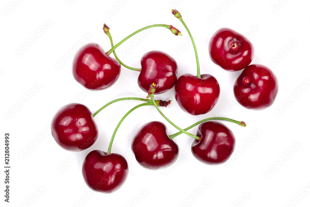 Sweet red cherries isolated on white background. Top view. Flat lay pattern Sweet red cherries isolated on white background. Top view. Flat lay pattern