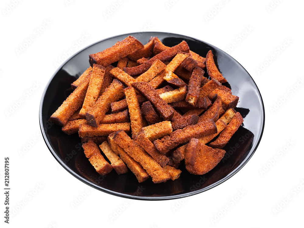 Fried bread croutons isolated on white background. Crispy rye bread sticks Fried bread croutons isolated on white background. Crispy rye bread sticks