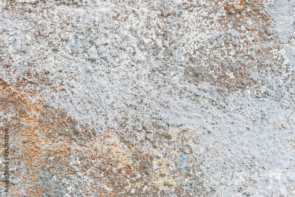 Wall fragment with scratches and cracks