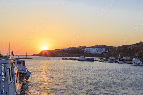 New port of Mykonos during sunset time near agios stefanos village in Mykonos island, Greece