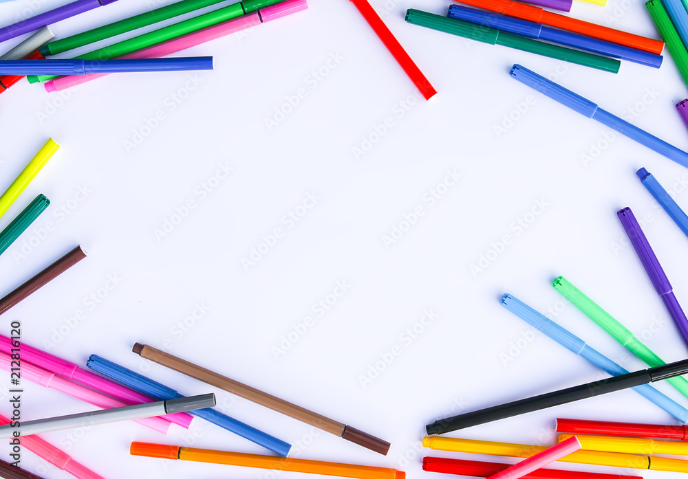 Fototapeta premium School supplies. Back to School design elements. Colorful markers and white empty paper sheet.
