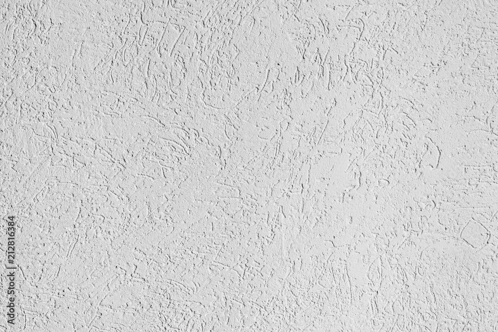 texture of the surface of the wall covered with decorative plaster of the woodworm type texture of the surface of the wall covered with decorative plaster of the woodworm type