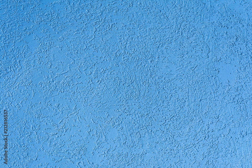 texture of the surface of the wall covered with decorative plaster of the woodworm type texture of the surface of the wall covered with decorative plaster of the woodworm type