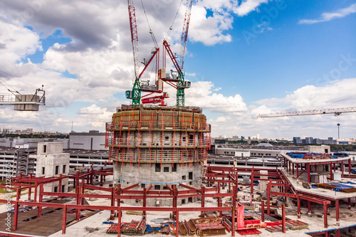 Lots of tower Construction site with cranes and building with blue sky photo