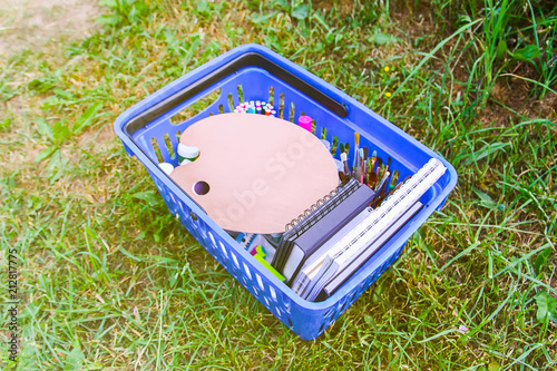 School supplies in shopping cart. Back to School design elements.