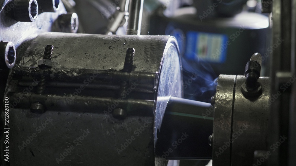 Pipes manufacturing production line. Manufacture of plastic water pipes of the factory. Process of making plastic tubes on the machine tool with the use of water and air pressure. Pipes manufacturing production line. Manufacture of plastic water pipes of the factory. Process of making plastic tubes on the machine tool with the use of water and air pressure.