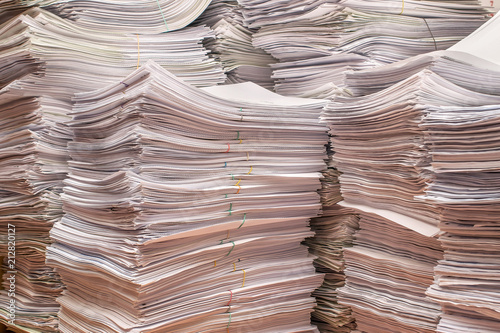 pile of paper documents in the office