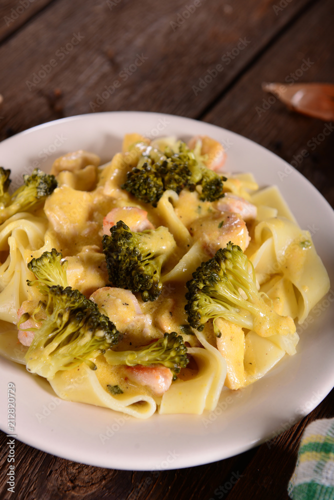 Pasta with broccoli and chicken with cheese sauce Pasta with broccoli and chicken with cheese sauce