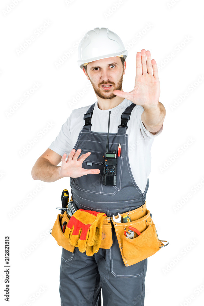 A construction man shows a stop sign. isolated on white background