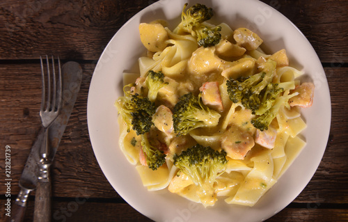 Pasta with broccoli and chicken with cheese sauce