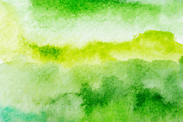 Green watercolor background. by drawing