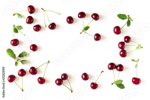 Cherry pattern. Ripe cherry berries and leaves isolated on white background. Berry summer background. Flat lay, top view, copy space 
