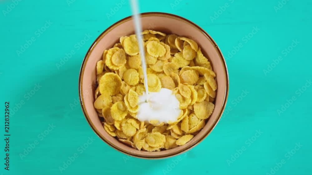 milk splash in a plate. youghurt pouring in breakfast dish. milk splash in a plate. youghurt pouring in breakfast dish.