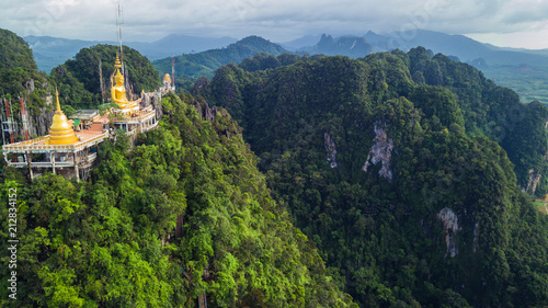 Buddha on the top Mountain of Wat Tham Seua (Tiger Cae) , Krabi,Thailand