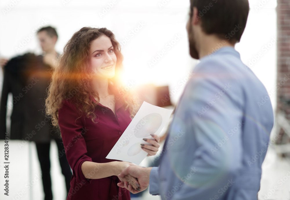 handshake between the designer and the client handshake between the designer and the client
