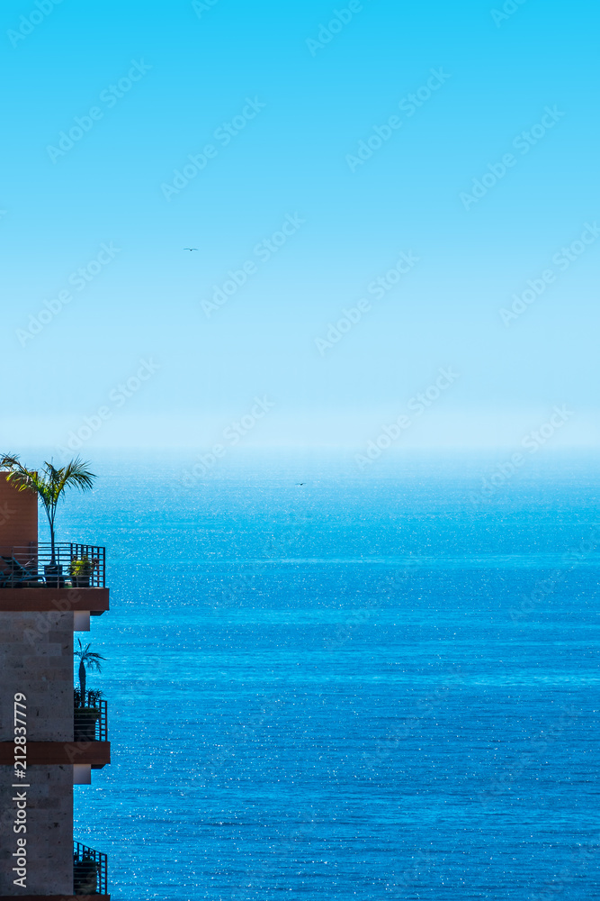 Luxury tropical apartments, condos, balconies overlooking the wide open ocean Luxury tropical apartments, condos, balconies overlooking the wide open ocean