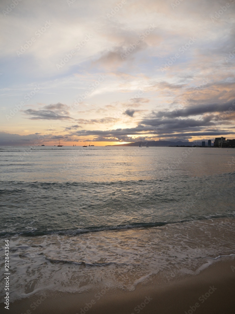 sunset clouds in waikiki beach hawaii