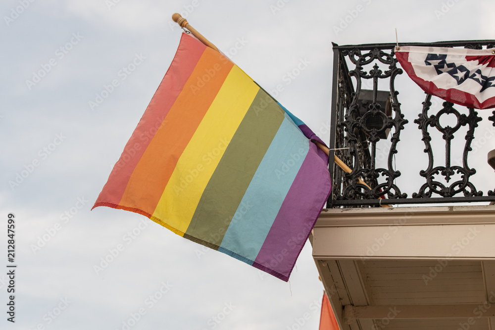rainbow flag flies high and proud