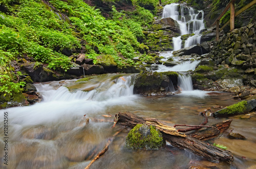 Landscape of waterfall Shypit in the Ukrainian Carpathian Mountains on the long exposure in summer morning. Zakarpattya  Ukraine