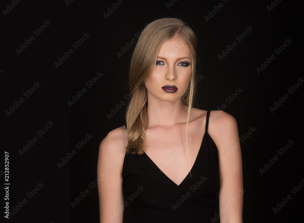 Naklejka premium Hairdresser and beauty salon. Makeup look and skincare of sensual girl. Sexy woman with blonde hair isolated on black. Girl with pigtail blond hair. Fashion model with makeup and stylish hairdo.