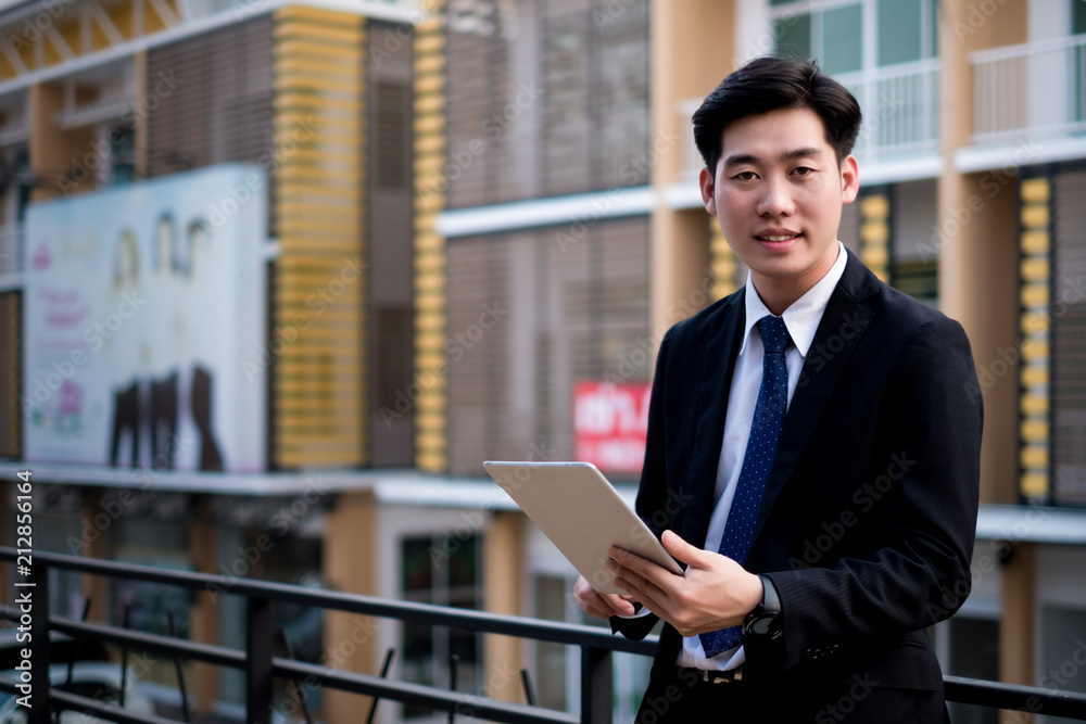 Young businesswoman work with mobile phones and notebooks in the office, business concept Young businesswoman work with mobile phones and notebooks in the office, business concept