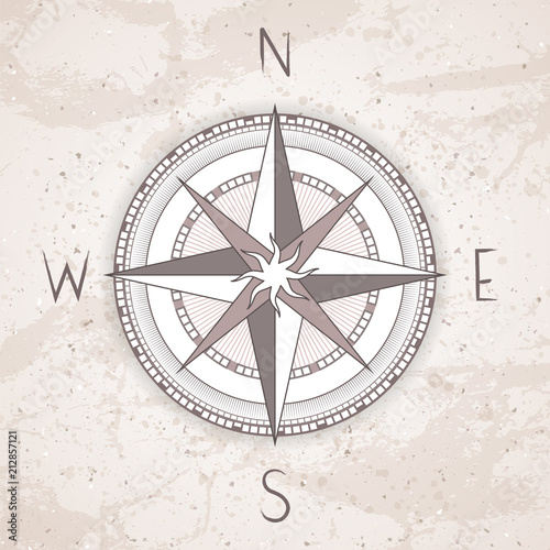 Vector illustration with a vintage compass or wind rose on grunge background.