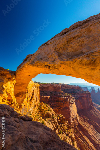 Beautiful sunrise scenery at Mesa Arch, Arches National Park, Utah, on a clear summer day