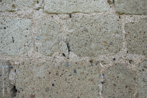 Beautiful wallpaper background of a wall made giant concrete bricks. No people.