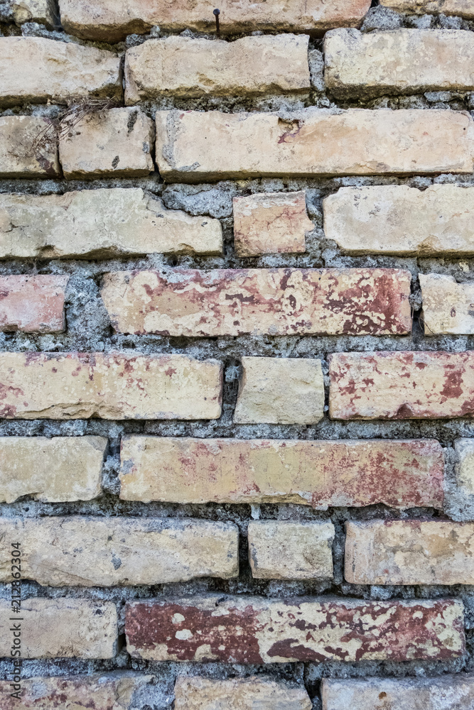 Vertical view of an old brick wall texture. No people. Vertical view of an old brick wall texture. No people.