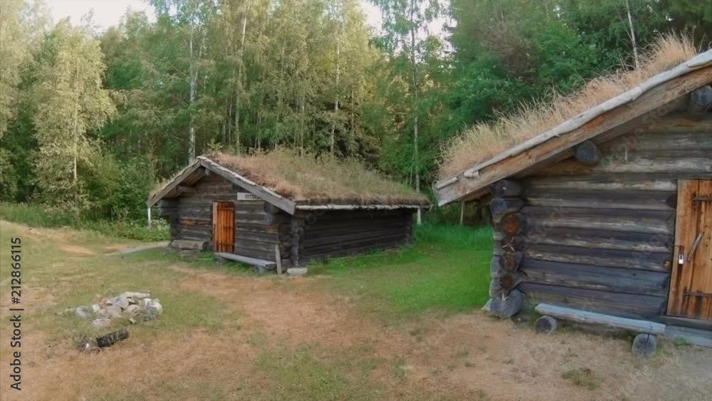 Old wooden houses with grass roof in Dalarna, Sweden Old wooden houses with grass roof in Dalarna, Sweden