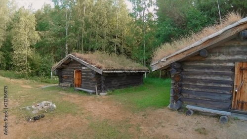 Old wooden houses with grass roof in Dalarna, Sweden photo