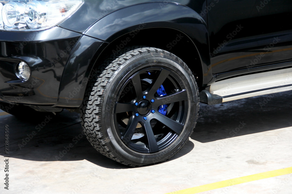 pickup truck's tire or tire wheel in the car parking