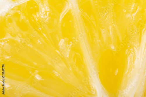 Cross section of bright yellow lemon, close-up