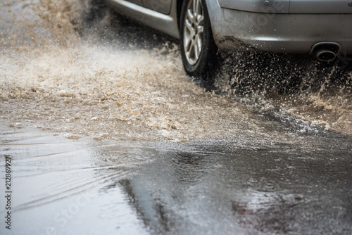 dirty water splash after vehicle roaring by