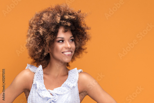 Beauty portrait of afro young smiling lady.