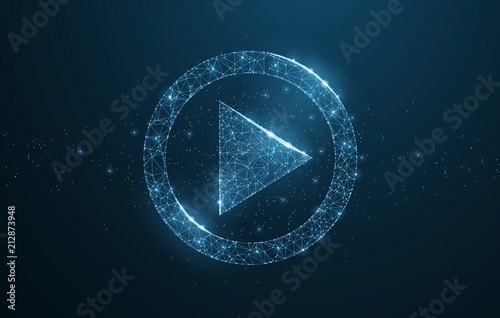 Polygonal wireframe play icon looks like constellation photo