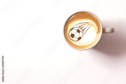 Coffee cappuccino in a cup for breakfast for a football fan