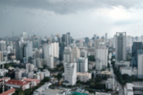 abstract blur and defocused rain clouds over city, aerial cityscape for background © happycreator