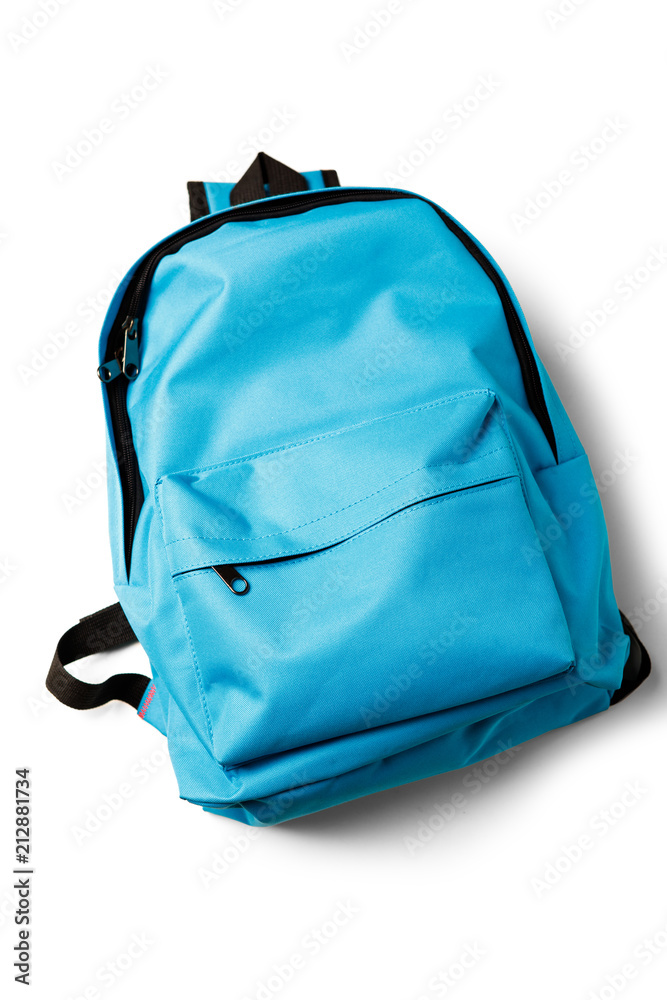 Top view of blue school backpack on white background. - obrazy, fototapety, plakaty 